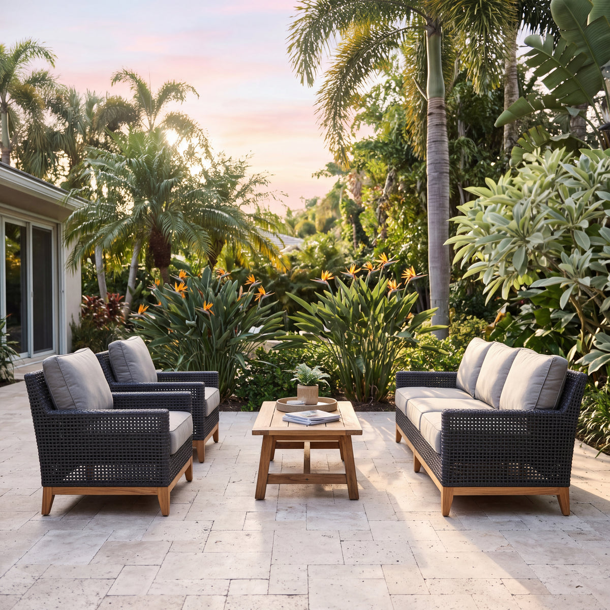 Royal Teak Collection Cannes 3-Piece Living Set (Sofa & 2 Club Chairs in Canvas Granite) on a Sunset Travertine Patio