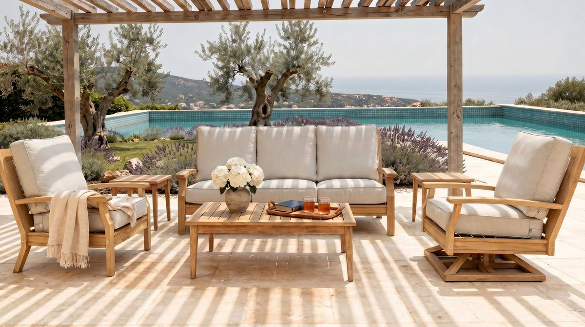 Hamptons teak seating with ivory cushions beneath a pergola