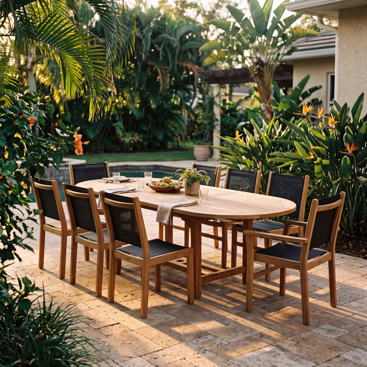 Royal Teak Collection 96/120 Oval Family Expansion 9-Piece Dining Set with 6 Captiva Black Side Chairs and 2 Captiva Black Arm Chairs (Golden Hour Patio)